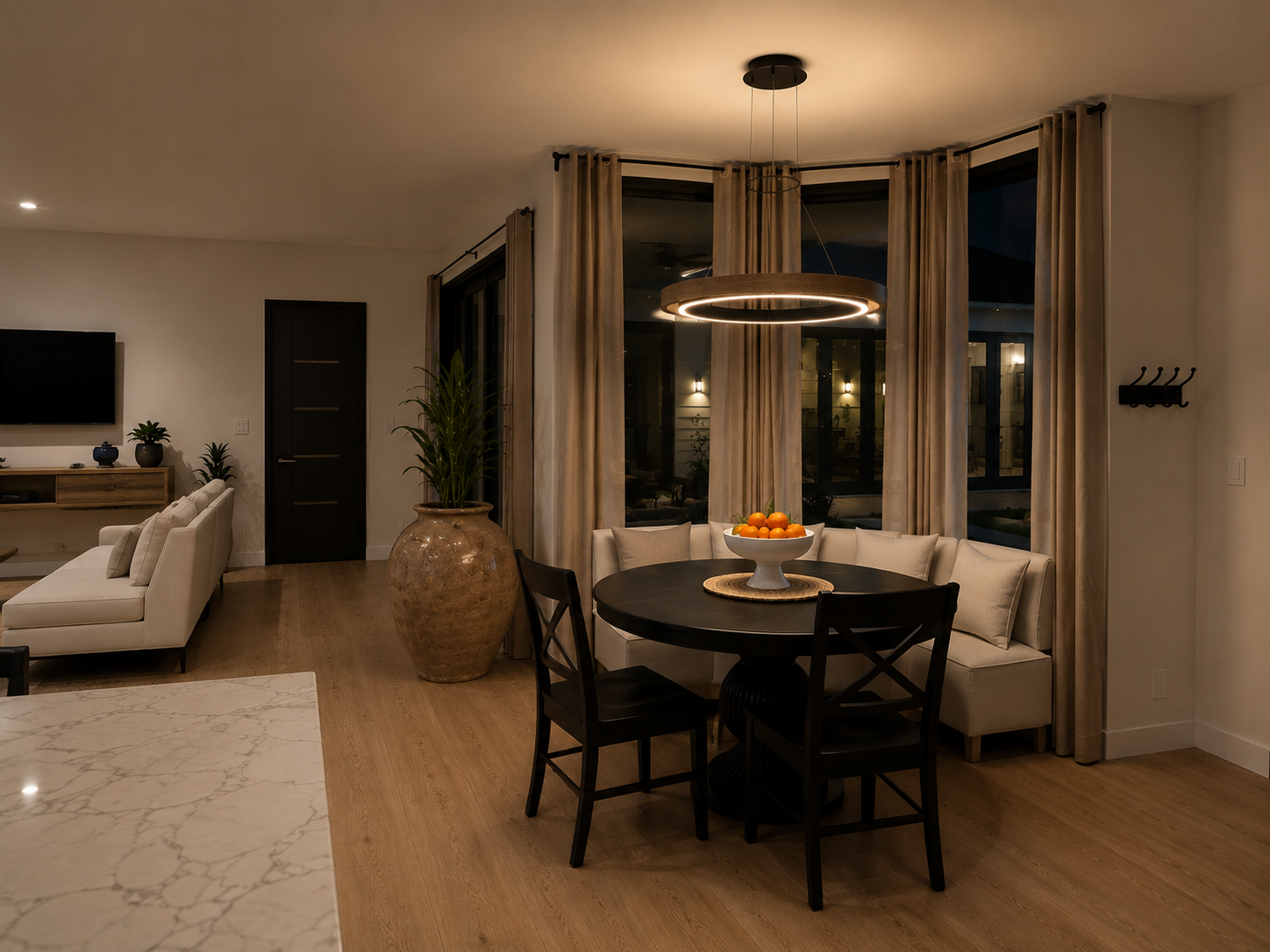 An informal dining table in a warm, light-filled residential interior